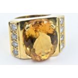 Large unmarked high carat white metal citrine and diamond ring, the centre stone approximately 20