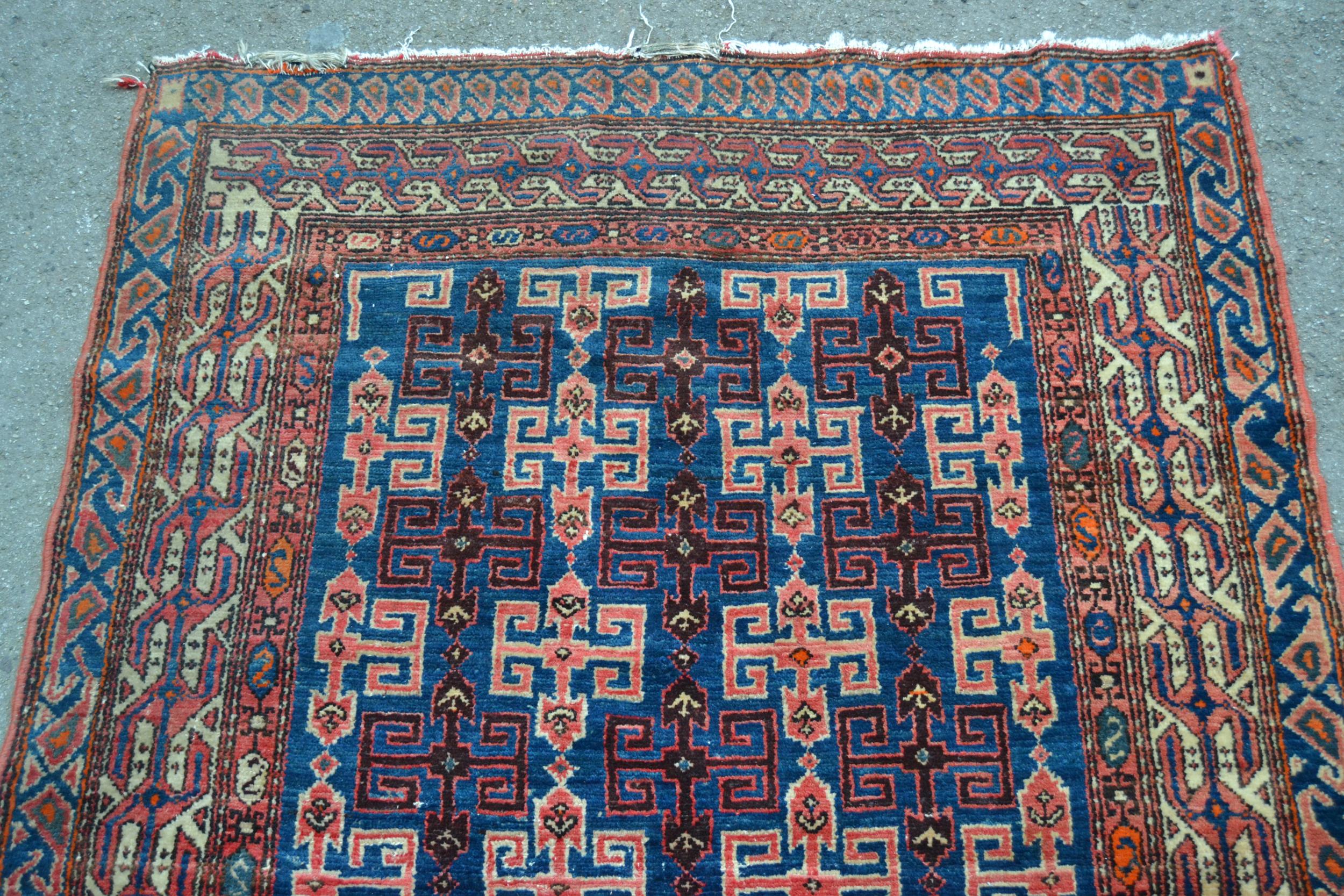 Kurdish rug with an all-over hooked medallion design on a deep blue ground with multiple border, 6ft - Image 3 of 5