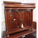 William IV mahogany side cabinet having single moulded drawer above two arch top panelled doors on