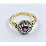 18ct Yellow gold ruby and diamond flowerhead cluster ring, head diameter 11mm approximately, with