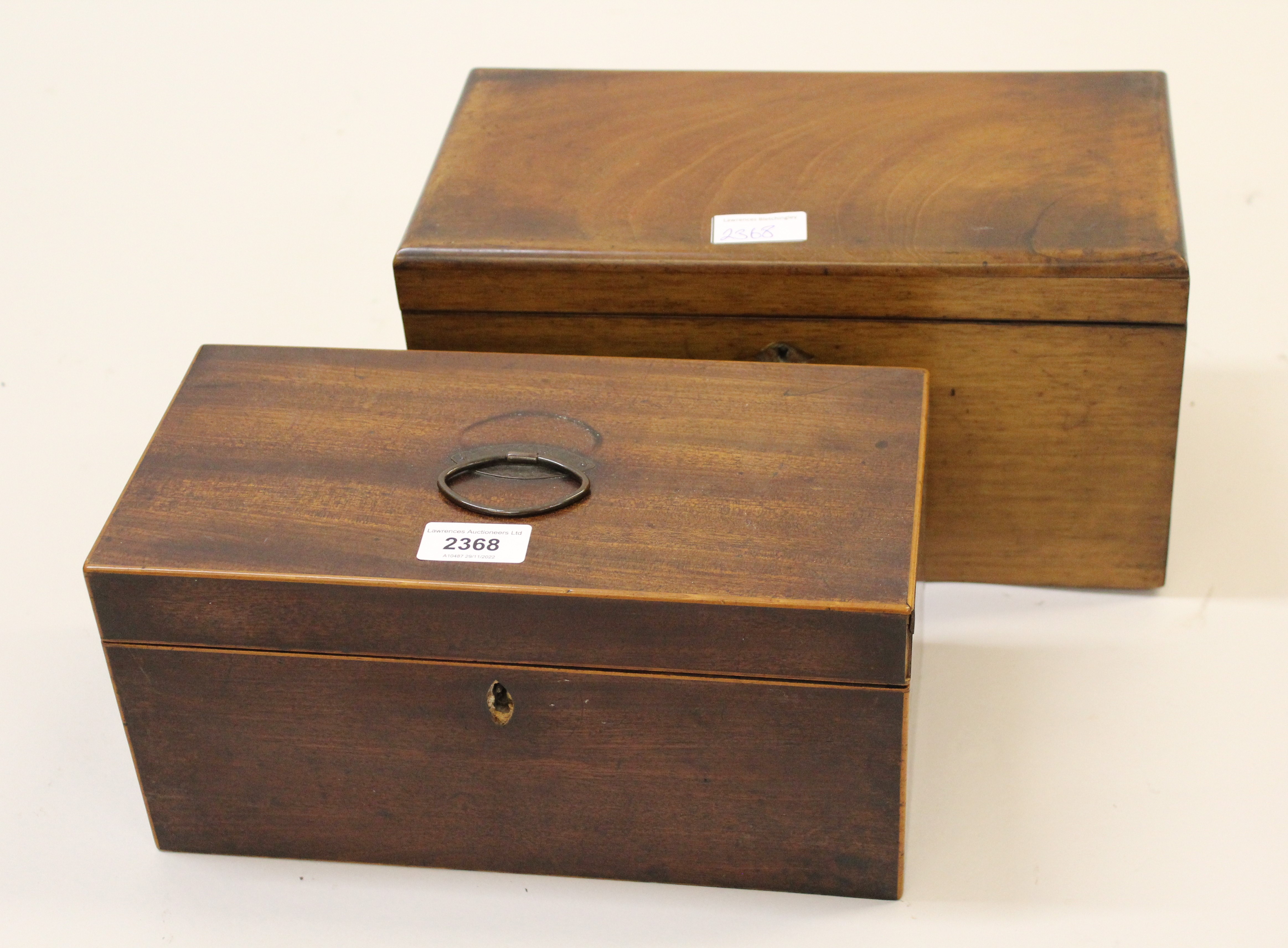 George III mahogany boxwood line inlaid, three division tea caddy, together with a similar 19th