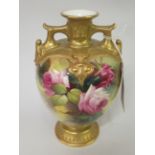 Royal Worcester two handled baluster form pedestal vase, painted with red roses by R. Austin, date