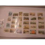 Collection of twenty-eight ' Hold To Light ' postcards