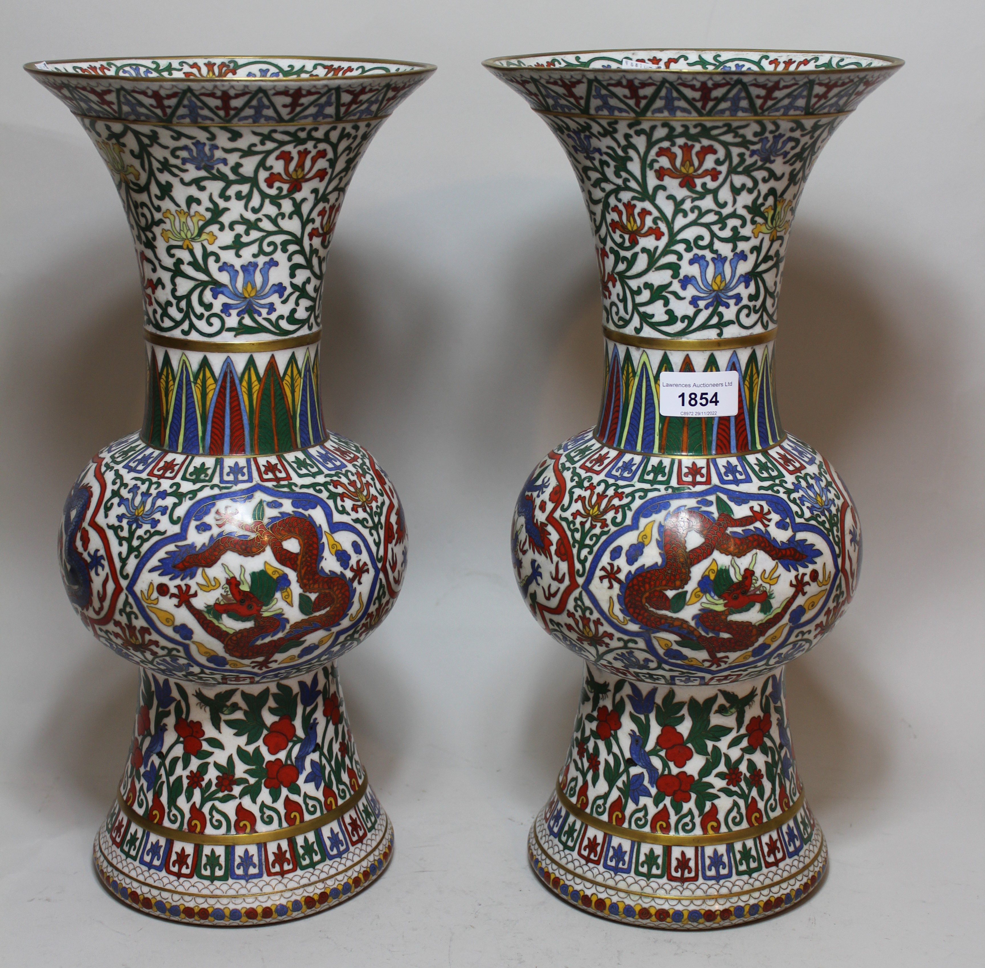 Pair of large Chinese cloisonne baluster form flared rim vases, with dragon and floral decoration,