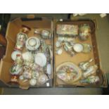 Two boxes containing a large collection of various Chinese porcelain boxes, vases, teacups,