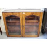 Regency mahogany bookcase top decorated with bead pattern mouldings and with two arched bevelled