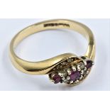 Yellow gold ruby and diamond crossover ring, size 'O'