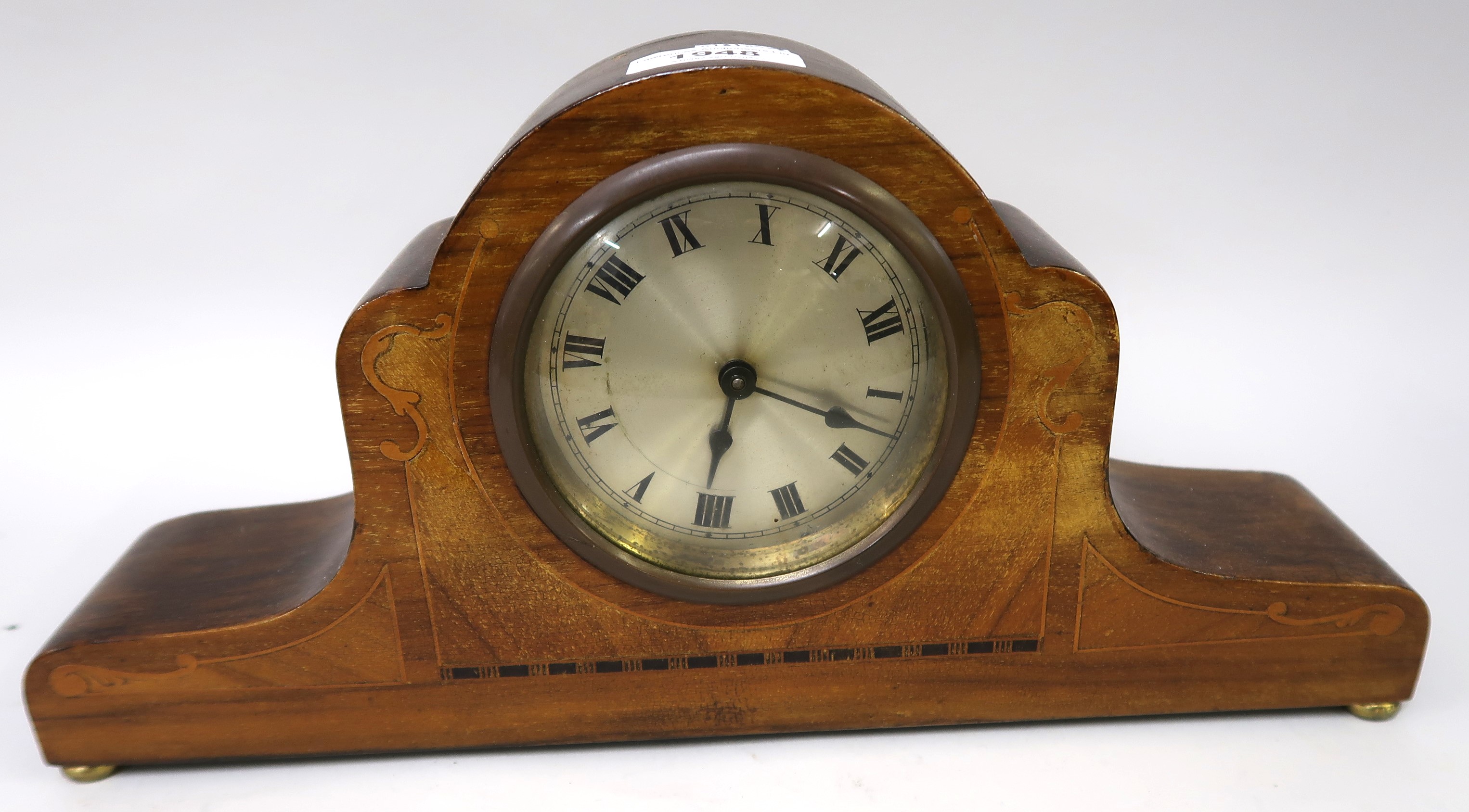 Edwardian walnut and inlaid mantel clock, the silvered dial with Roman numerals