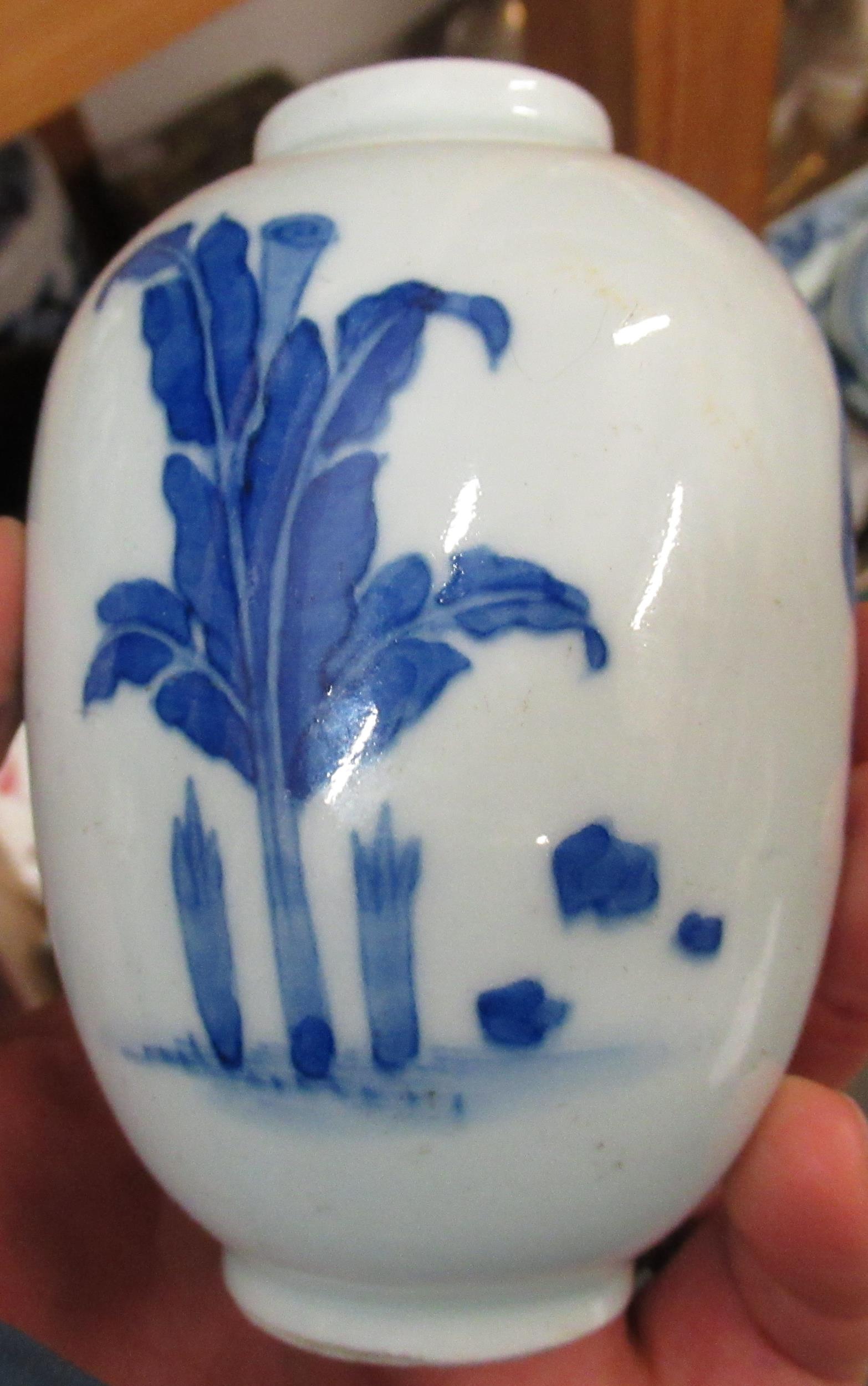 Pair of small Chinese baluster form vases, blue and white decorated with figures seated at a - Image 4 of 8