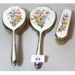 Birmingham silver and floral decorated translucent enamel three piece dressing table set