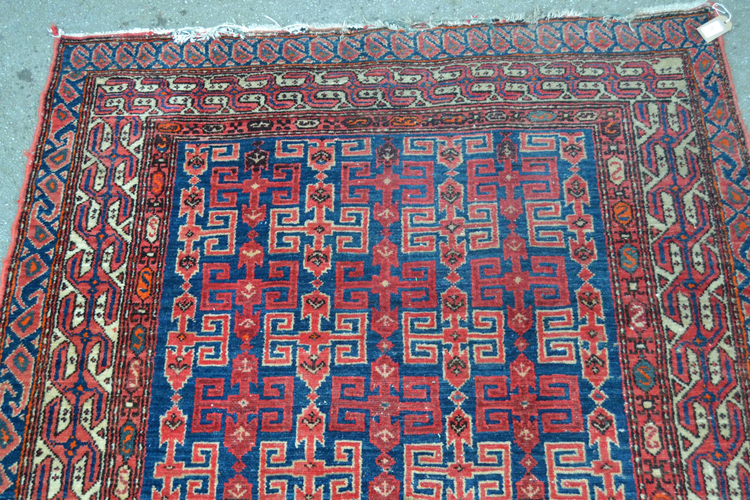 Kurdish rug with an all-over hooked medallion design on a deep blue ground with multiple border, 6ft - Image 2 of 5