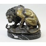 Good quality 20th Century patinated bronze figure of a lion fighting a snake, on an oval integral