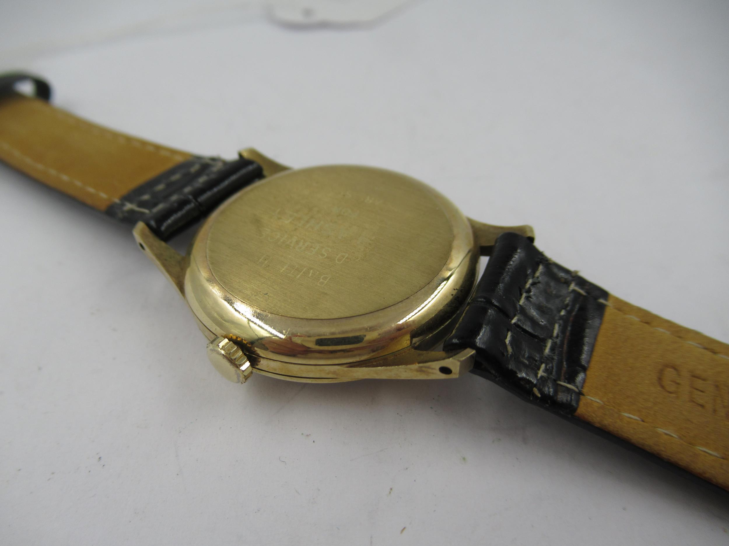 Gentleman's 9ct gold cased wristwatch by Garrards, the silvered dial with Arabic and baton numerals, - Image 3 of 4