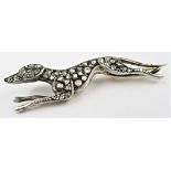 9ct Yellow gold and silver mounted brooch in the form of a greyhound set rose cut diamonds