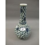 Modern Chinese blue and white floral decorated baluster form, narrow neck vase, 12ins high