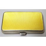 Birmingham silver and yellow translucent enamel rectangular cigarette case, 8.5cm wide No chips or