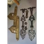 Pair of antique steel door hinges, together with a pair of ornate brass door plates Measurements: