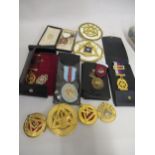 Box containing a small quantity of Freemasonry related items All medals are gilt