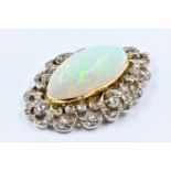 Large fire opal and diamond set pendant, the shaped pierced surround set old and rose cut stones,