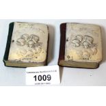 Two small silver mounted prayer books of Whispers design