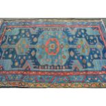 Hamadan rug with a lobed medallion design on blue ground with borders, 6ft 3ins x 4ft 2ins (slight