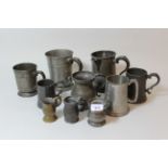 Box containing a collection of various 19th and 20th Century pewter tankards etc.