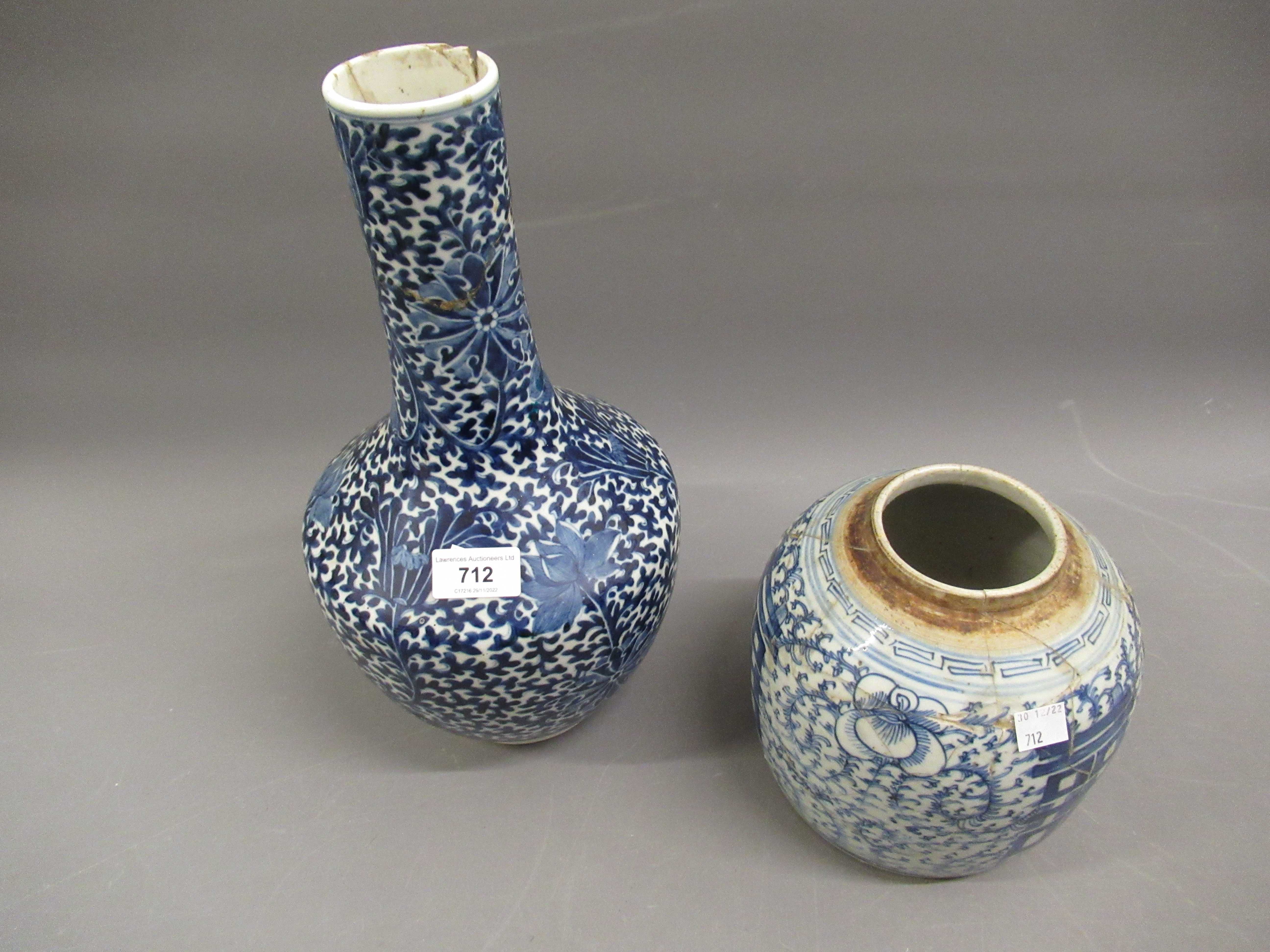 Chinese blue and white baluster form vase with all-over floral decoration, with four character