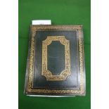Gilt tooled leather bound album containing a collection of miscellaneous prints and cuttings etc.