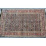 Indo Persian rug with an all-over Herati design on a midnight blue ground with brick red borders,