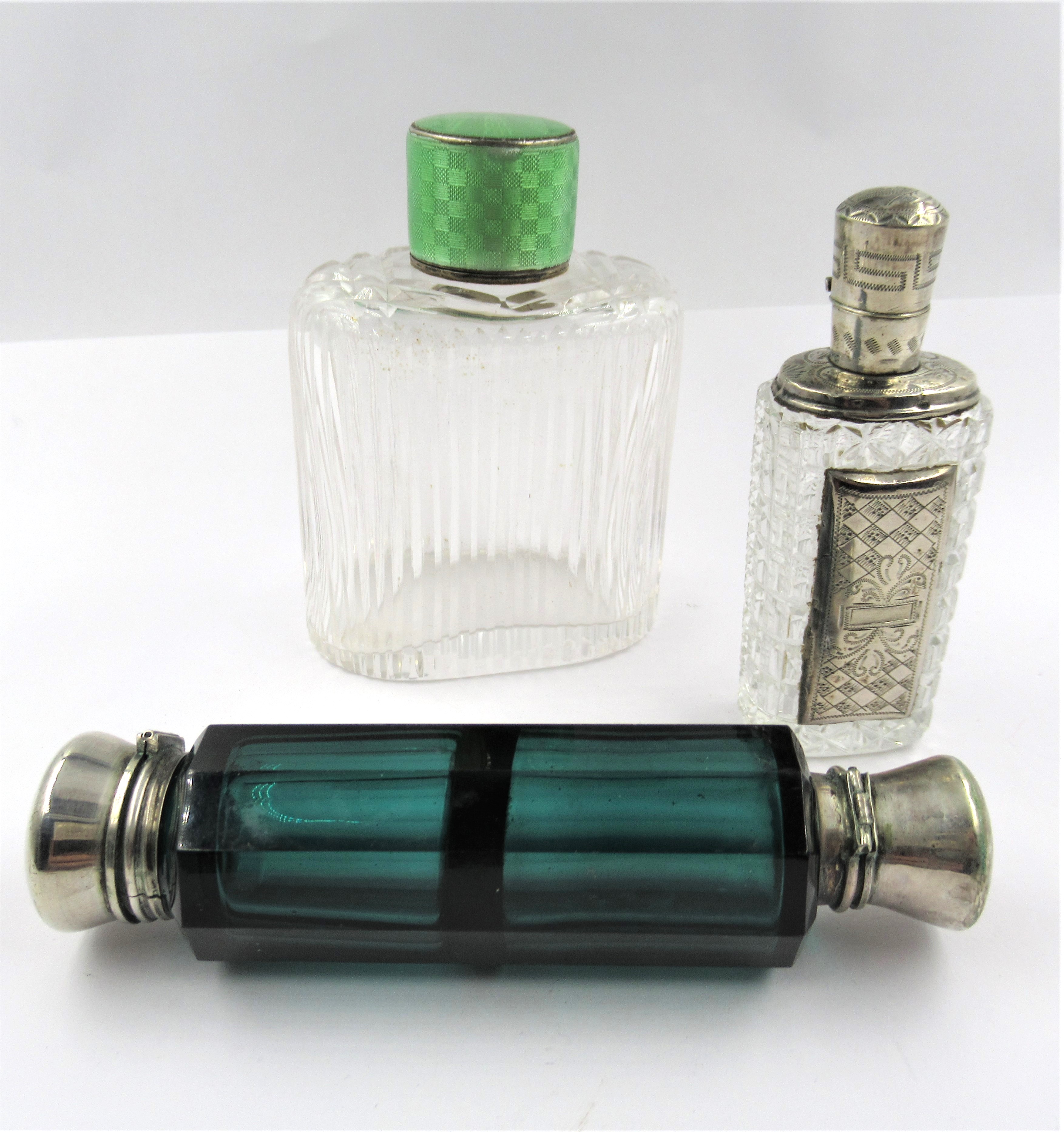 19th Century green glass double-ended scent bottle, 11.5cm long, together with two other scent