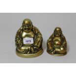 Brass figure of seated Buddha and another smaller