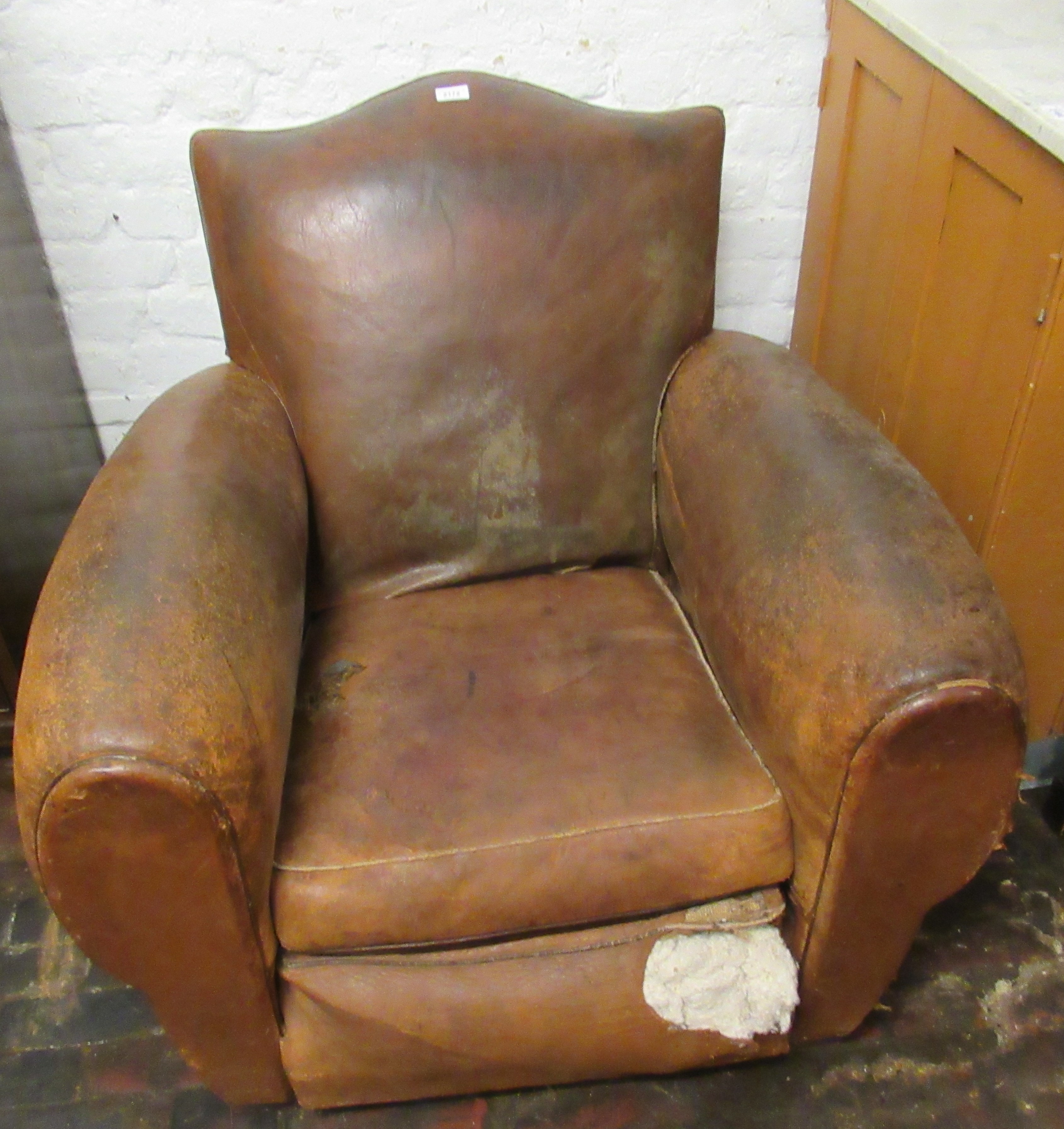 Late 19th / early 20th Century French brown leather upholstered library chair with loose cushion, (