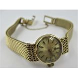 Ladies 9ct Gold cased Tissot wristwatch with integral 9ct gold bracelet, 21.5gms