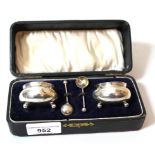 Pair of Birmingham silver circular salts with matching spoons in fitted case (lacking liners)
