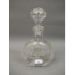 Baccarat Remy Martin, glass cognac decanter with fleur de lis medallions, 11ins high