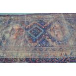 Shiraz rug with triple medallion design (extensive wear) 8ft 10ins x 5ft approximately