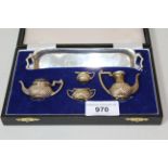 Miniature Birmingham silver four piece teaset on tray in fitted box