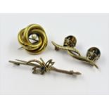 9ct Gold dragonfly bar brooch, 9ct gold tigers eye set bar brooch and a Victorian circular yellow