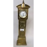 Edwardian brass miniature longcase clock, the enamel dial with Roman numerals and single train