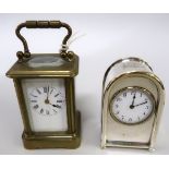 Miniature brass cased carriage clock with enamel dial and Roman numerals, (at fault), together