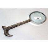 Chinese silver handled magnifying glass, the handle decorated with figures of dragons