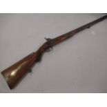 Percussion cap rifle with walnut stock, ramrod and brass mounts (at fault)