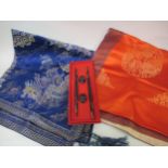 Red Chinese table runner, blue tablecloth, six green place mats, cased pair of chopsticks and two