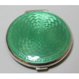 Sterling silver and green translucent enamel double-sided compact, the hinged cover enclosing a