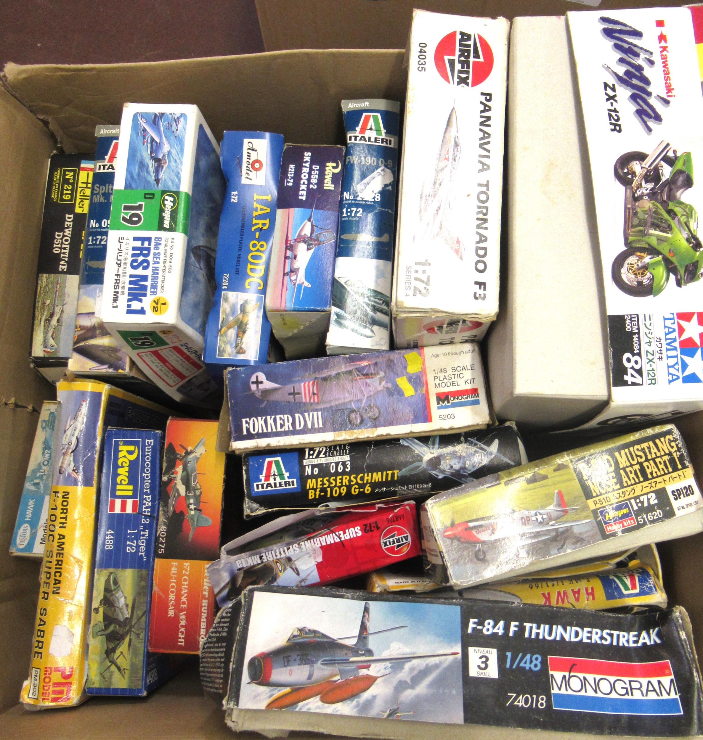 Seventeen unmade plastic model aircraft kits including Airfix etc