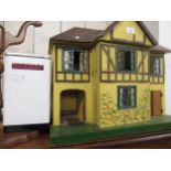 Mid 20th Century Tri-ang dolls house with a quantity of period furniture, together with a dolls
