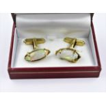 Pair of modern 18ct yellow gold and carved fire opal cufflinks, London 1997, 12.2g gross