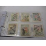 Album containing a collection of American cigarette and tobacco cards, together with Dutch and other