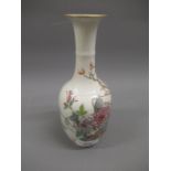 Small Chinese famille rose baluster form vase decorated with flowers and trees, red seal mark to