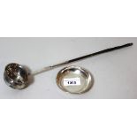 Antique white metal toddy ladle with whale bone twisted handle and a small circular London silver